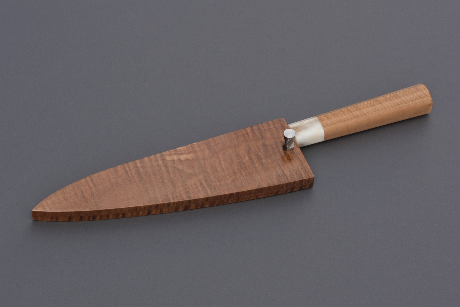 Nakama knife from Guldimann with a handle and sheath from Bijouwood flamed maple