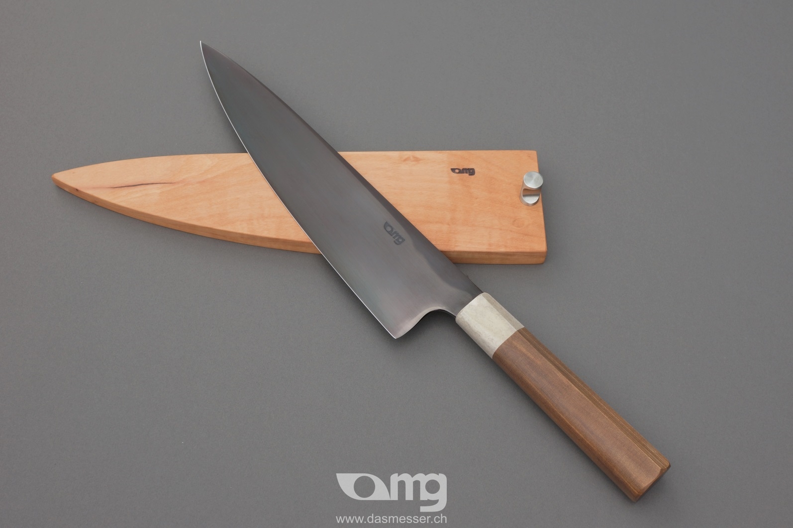 Nakama knife from Guldimann with a handle and sheath from Bijouwood flamed maple